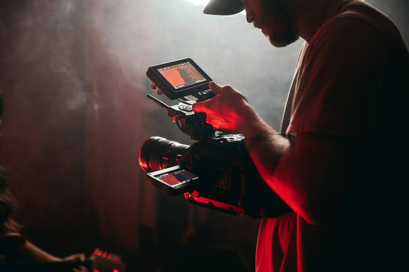 Videographer shooting with a cinema camera
